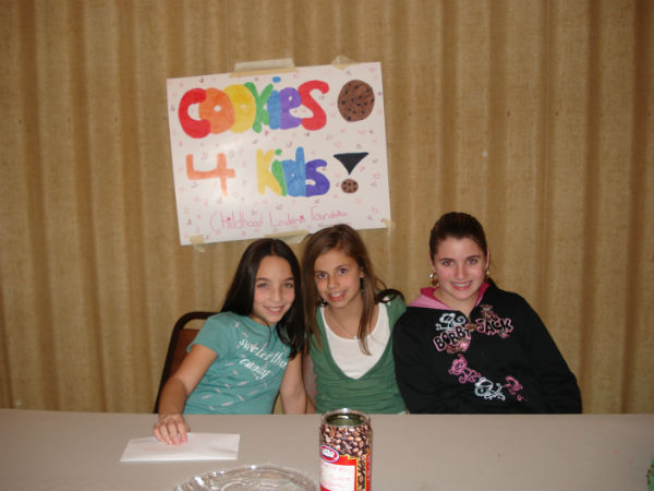 Students sell cookies to raise funds for sick children.