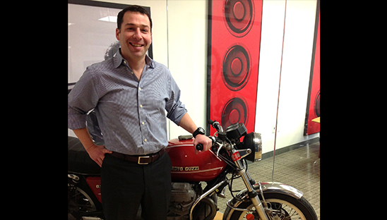 JCF fund holder Rafi Musher with one of the three motorcycles in his collection.